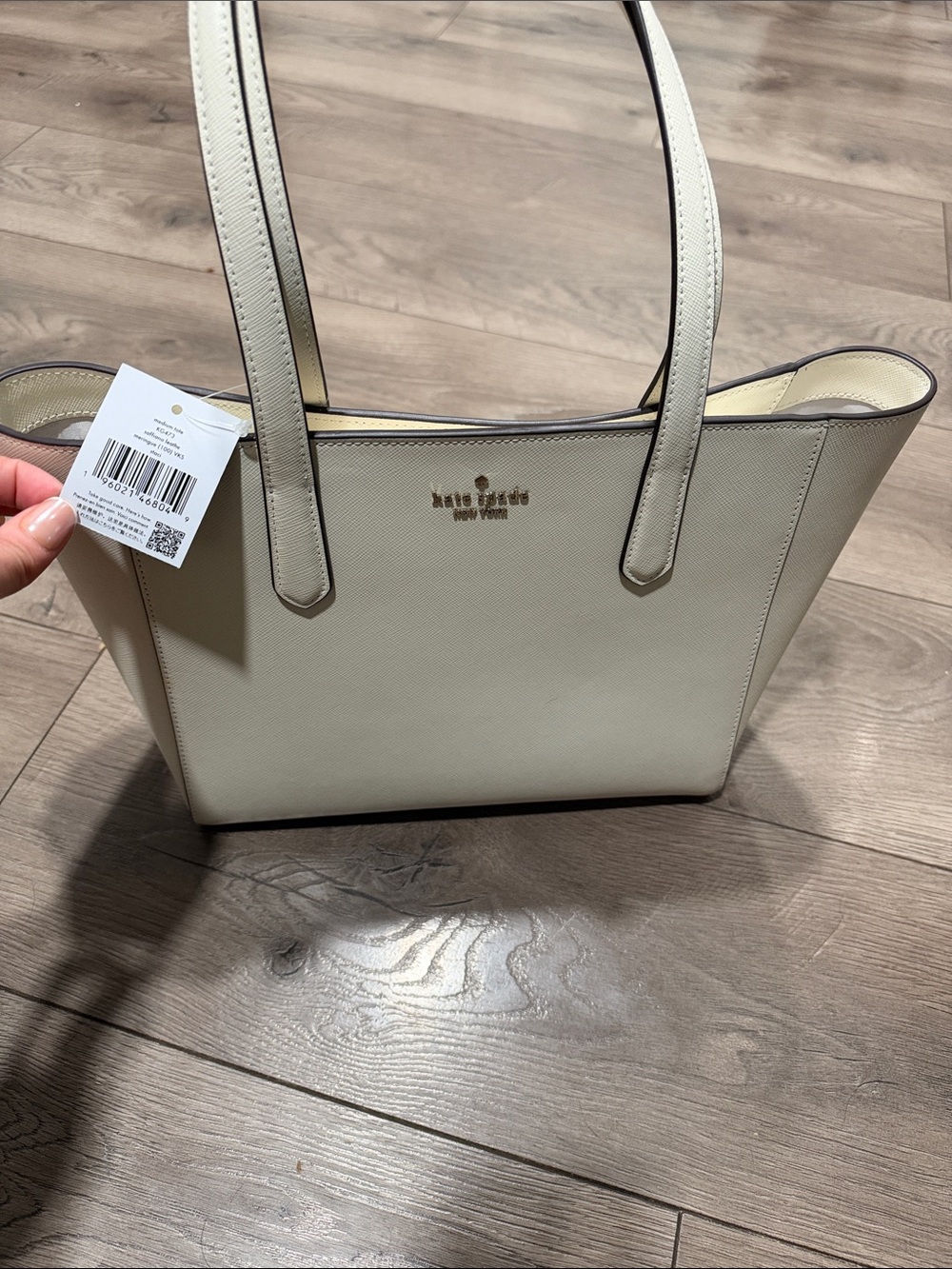kate spade cream leather tote with gold logo hardware
